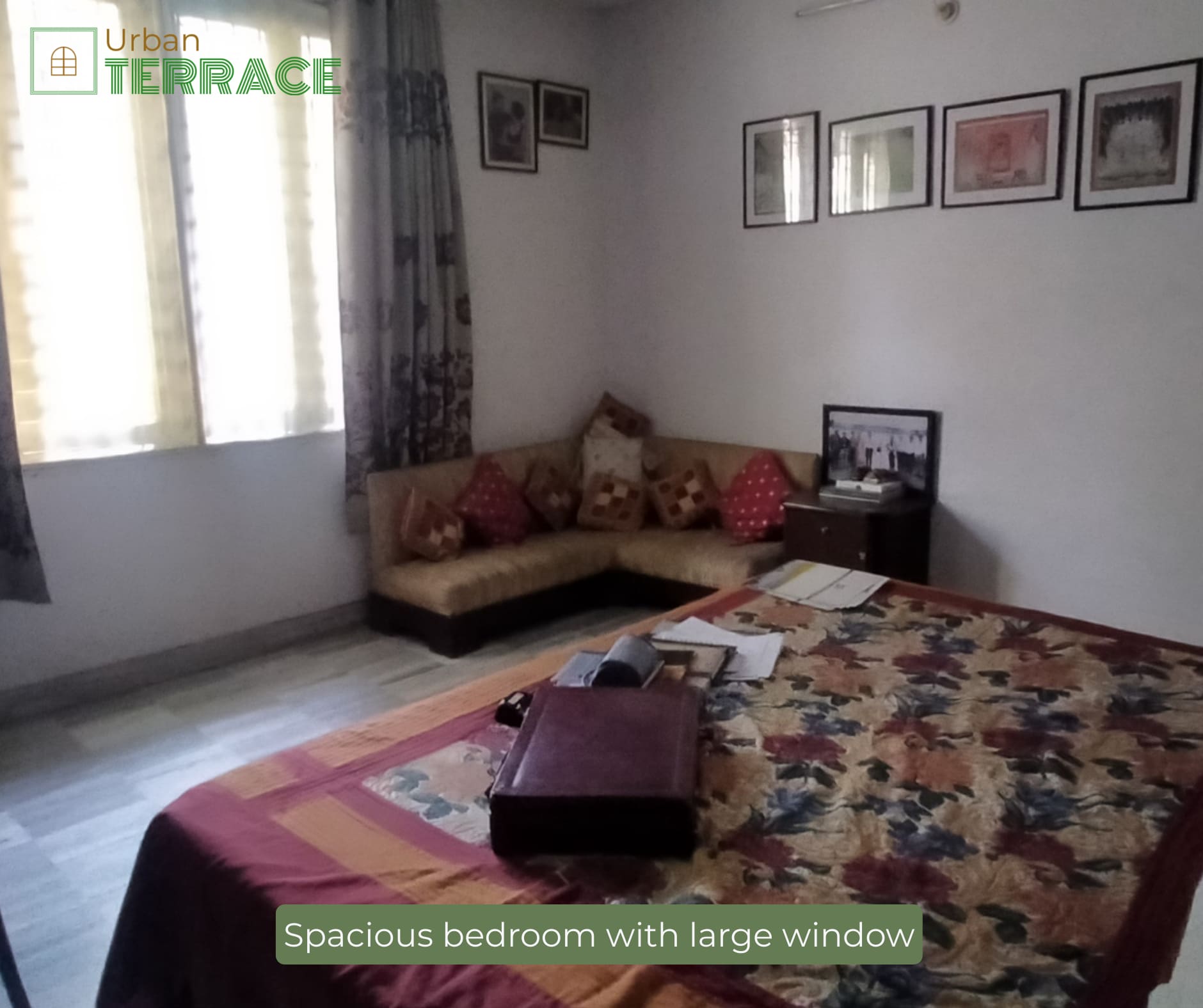 bedroom with large window bungalow for sale at manishpuri